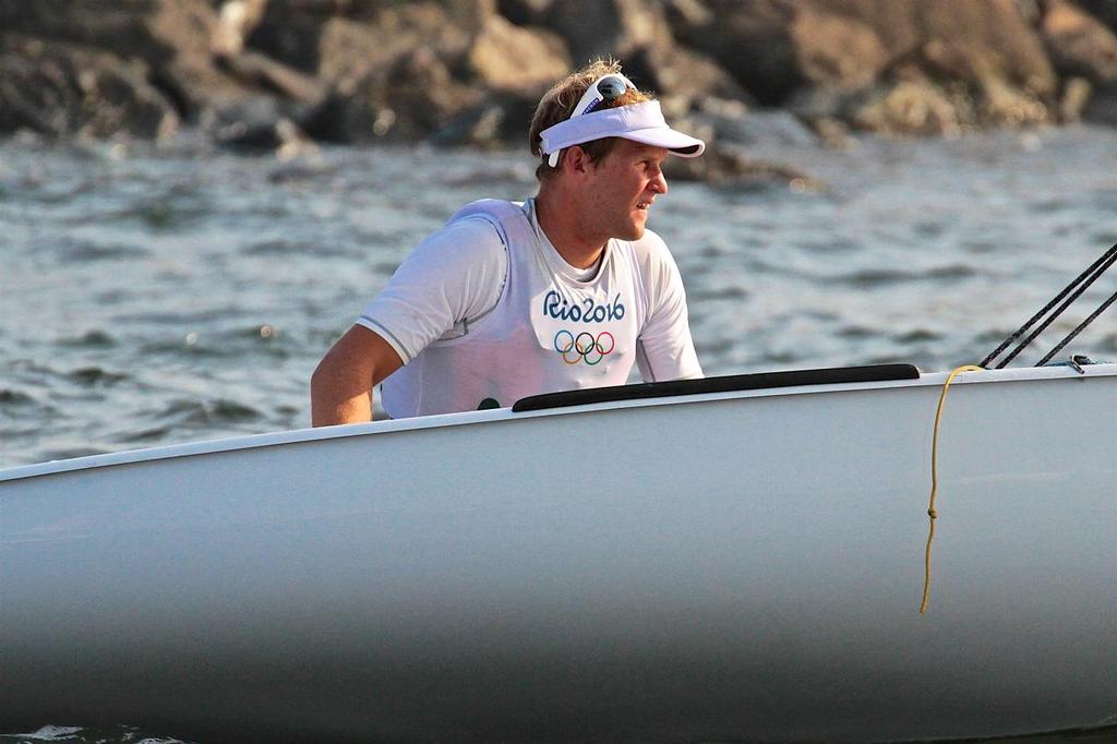 A pensive Josh Junior (NZL) on the return to the marina after Day 1 in the Finns © Richard Gladwell www.photosport.co.nz